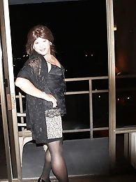 Melissa dons seductive fishnet attire in a 28-image collection on xHamster.