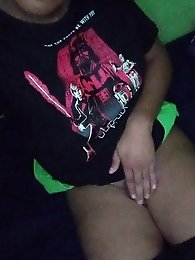 A beautiful shemale in pink stockings is having a good time