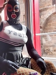 I m sitting in the window of the red light district